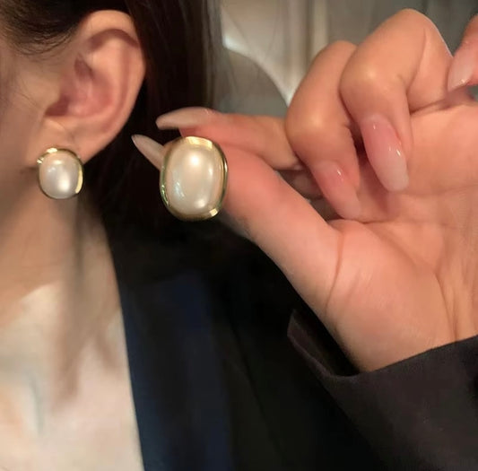 Elegant Gold-Framed Pearl Stud Earrings