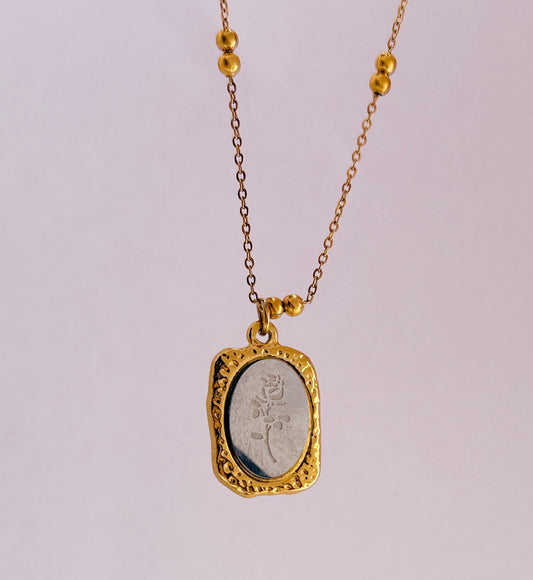 Golden Glow: Rose-Engraved Pendant Necklace