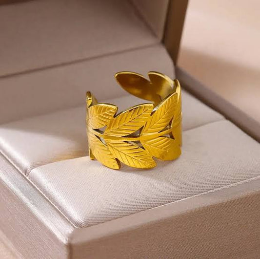 Wide band statement cuff ring