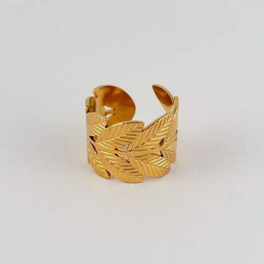 Wide band statement cuff ring