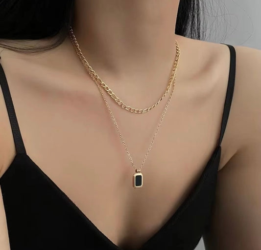 Elegant Gold Layered Necklace with Black Stone Pendant